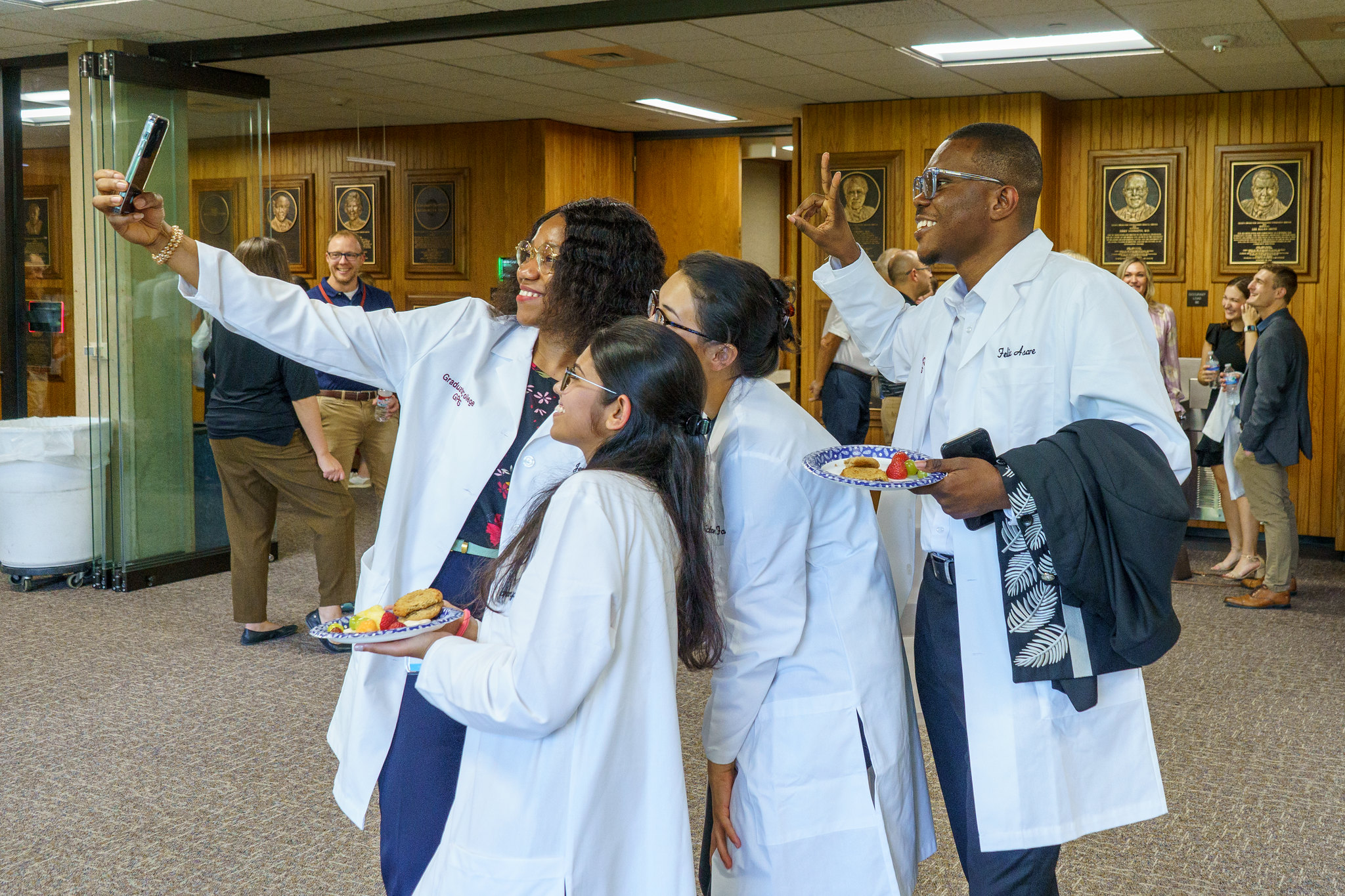 Tour guide speaking with prospective students